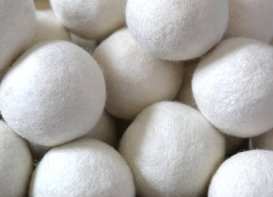 Close-up of white wool dryer balls